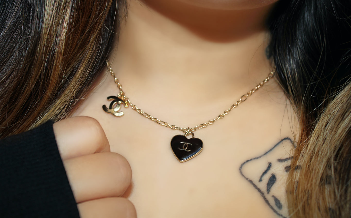 Black Heart Pendant Necklace with Gold Accents